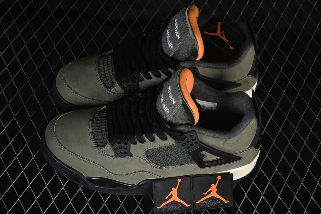 Pair of olive-green and black Jordan 4 sneakers shown from above with orange tongue details