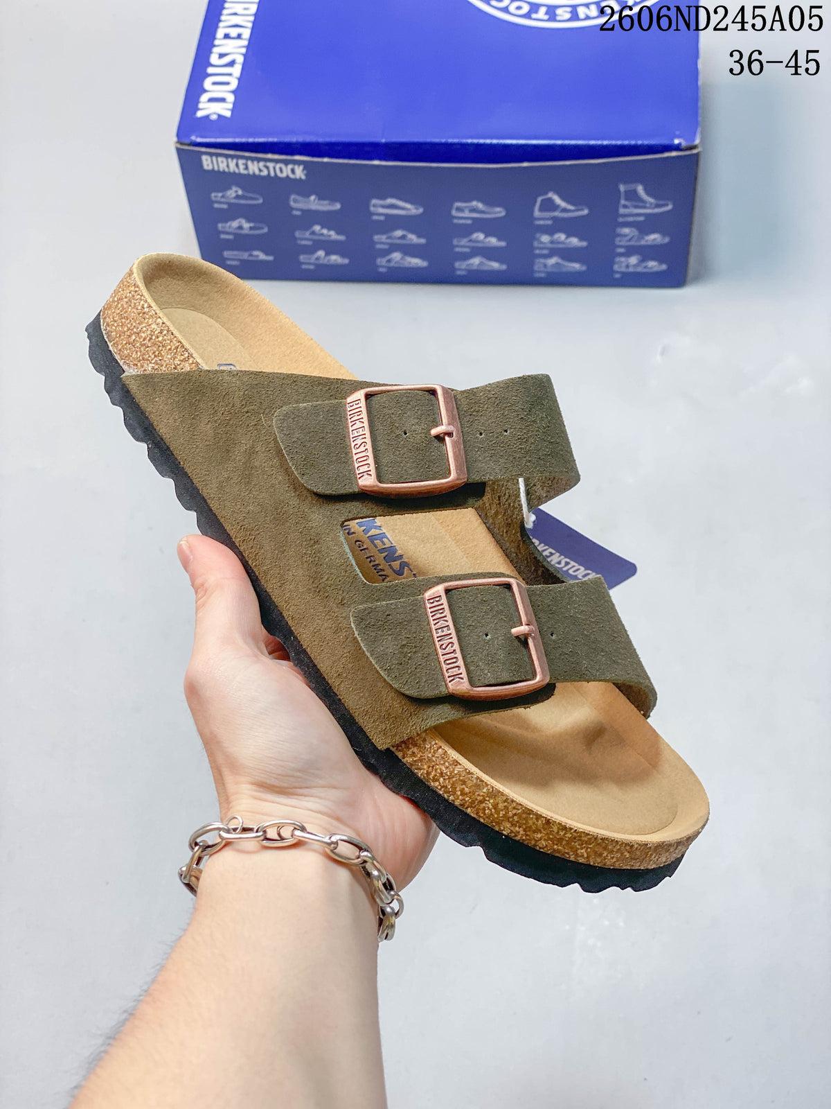 Olive green two-strap sandal with adjustable buckles.