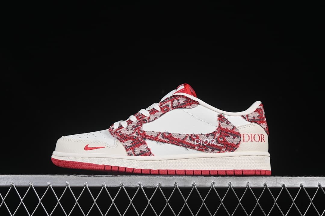 Side view of a cream-and-red low-top sneaker with patterned overlays and a red outsole