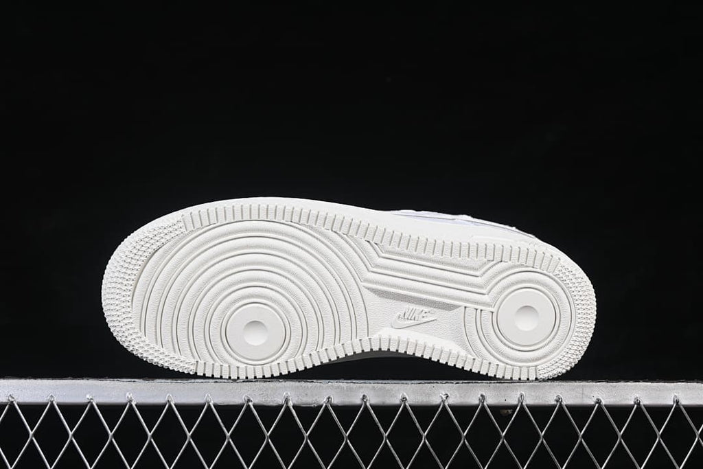 Underside view showing the circular outsole tread pattern.