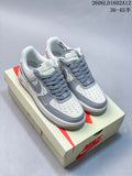 Pair of off-white and grey low-top sneakers with textured grey laces
