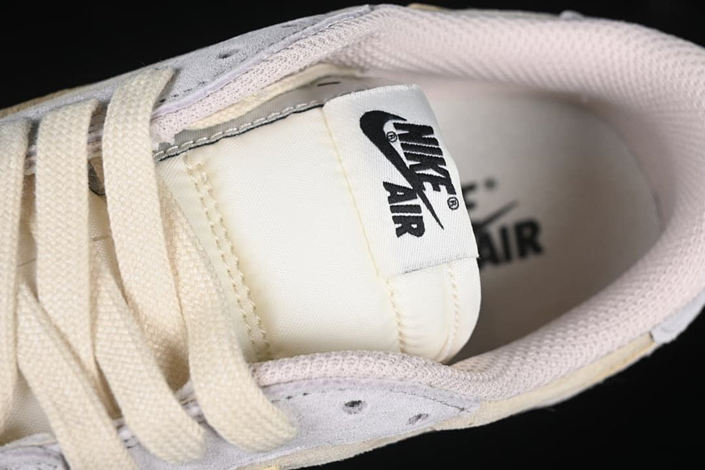 Close-up of the tongue label, laces, and collar