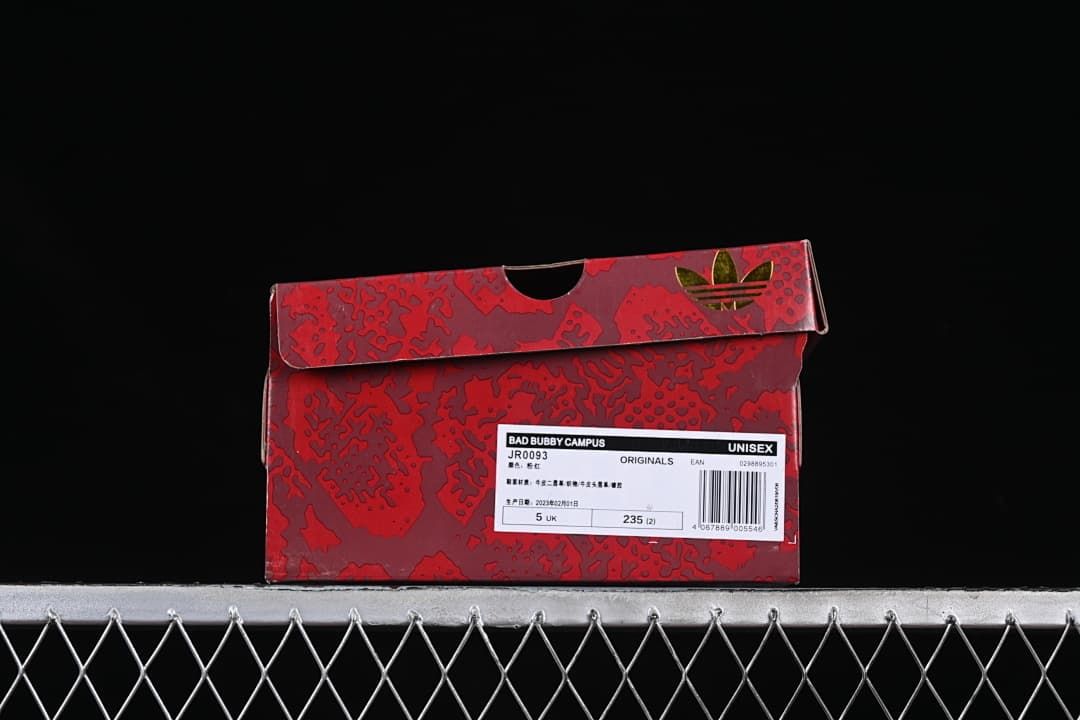 Red patterned shoe box with label showing JR0093 and UK size 5