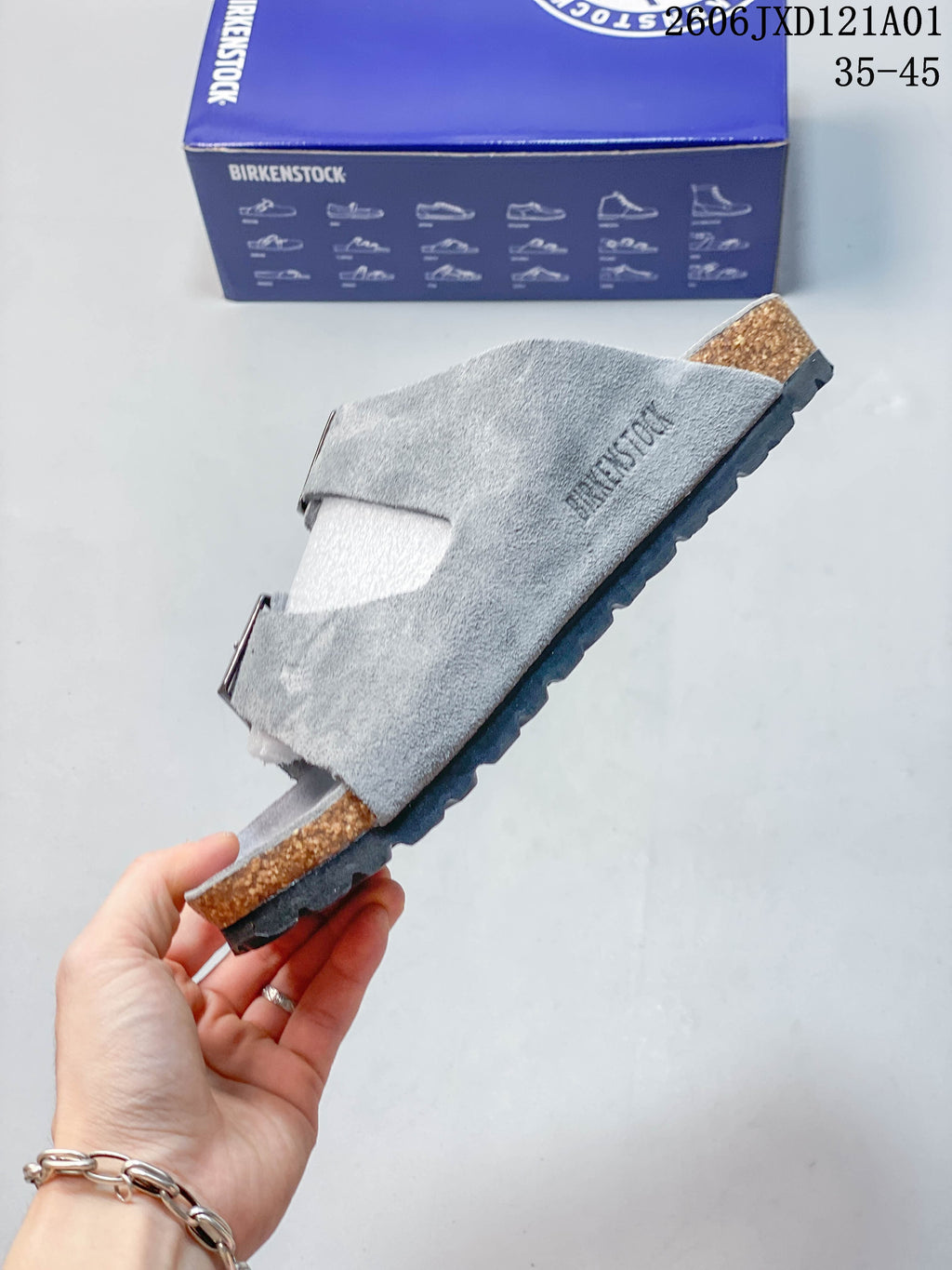 Side profile of a gray two-strap Arizona BS sandal