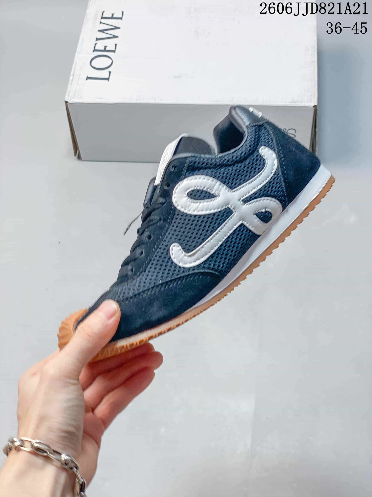 Side view showing the navy mesh upper and white side detailing
