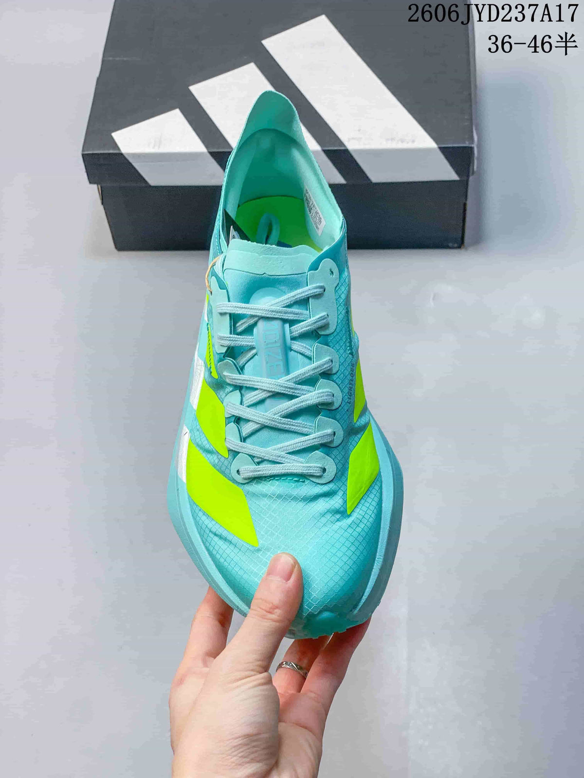 Front view of an aqua lace-up running shoe with neon yellow accents