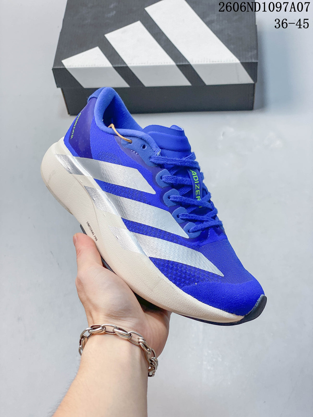 Angled side view of a blue adidas Adizero Evo SL shoe with silver stripes; image overlay shows 36–45.