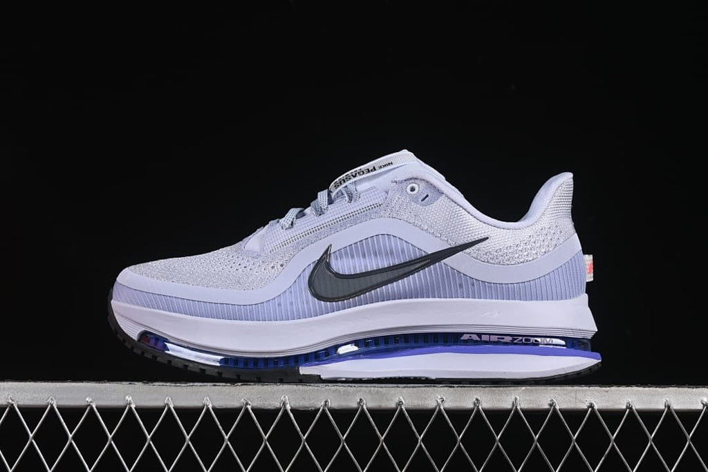 Side view of pale gray and lavender Nike Air Zoom Pegasus Premium running shoe