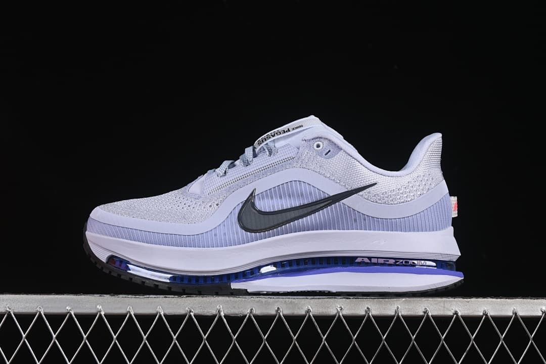 Side view of pale gray and lavender Nike Air Zoom Pegasus Premium running shoe
