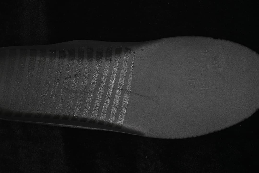 Close-up of the black rubber outsole.