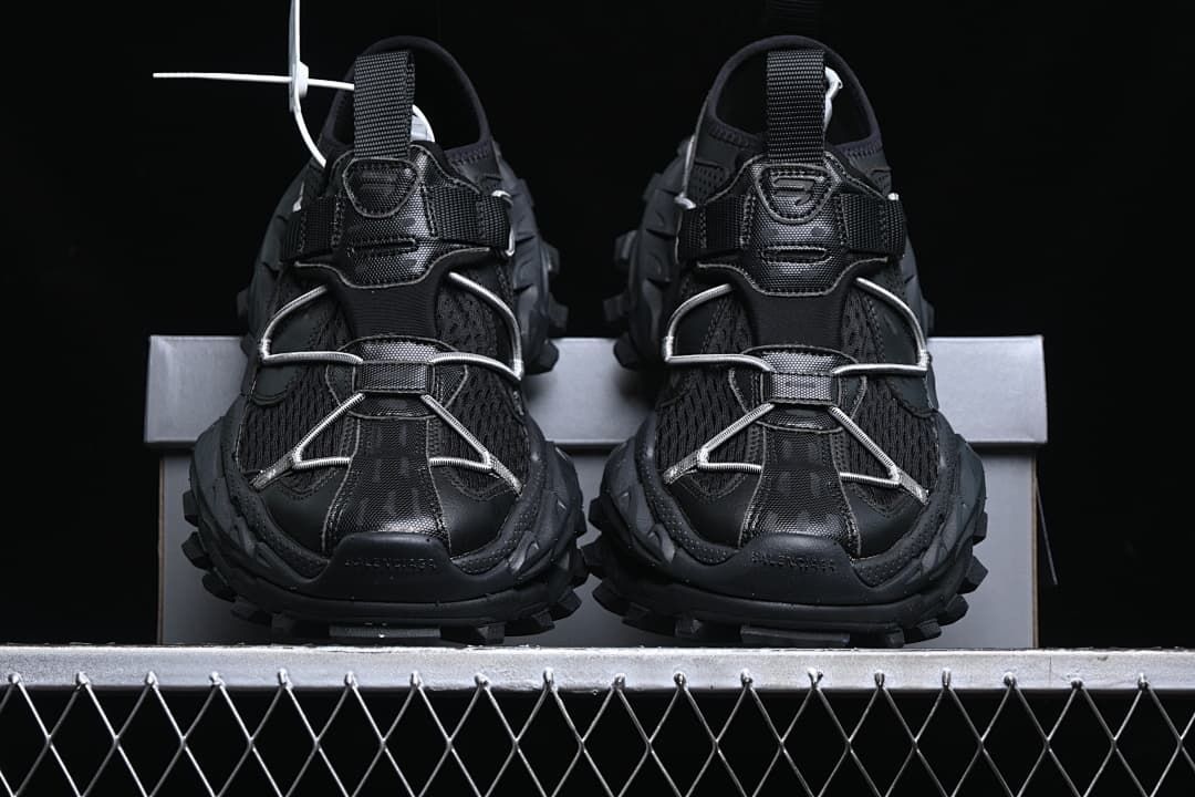 Front view of the pair showing cord lacing and rugged outsoles.