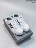 White adidas mule sneakers with dark side stripes, shown on a shoe box.
