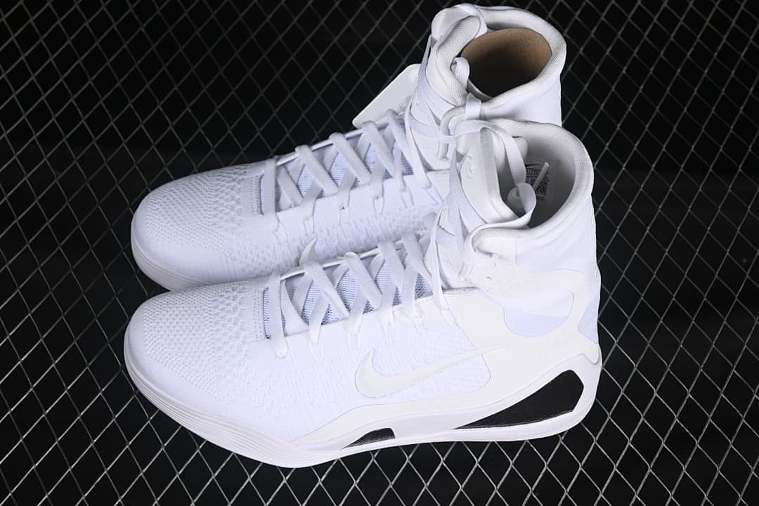 Pair of white high-top basketball shoes viewed from above at an angle