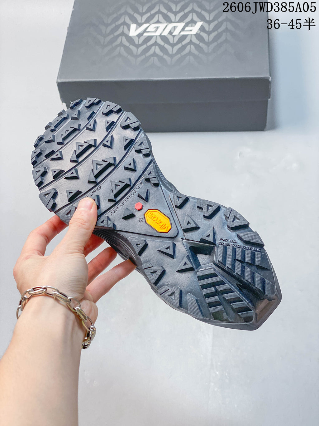 Close-up of the lugged outsole with Vibram branding