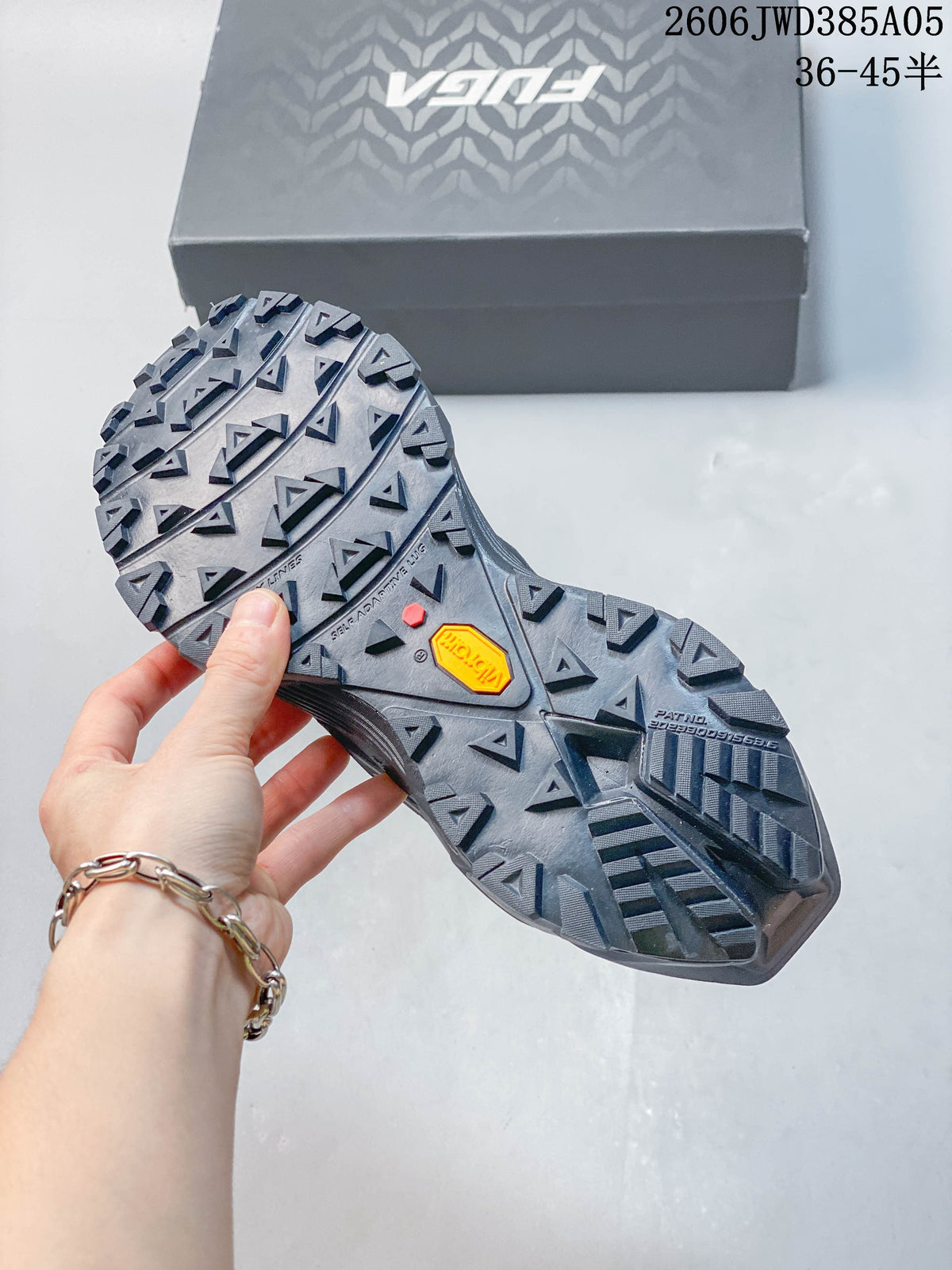 Close-up of the lugged outsole with Vibram branding