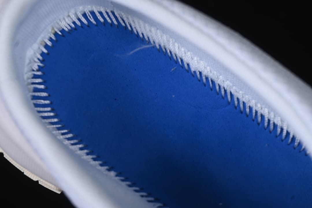 Close-up inside the shoe showing the blue footbed area