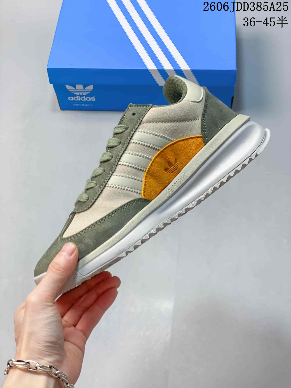 Side profile of the adidas SL 72 sneaker showing its stripes and mustard accent