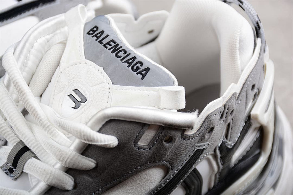 Close-up of the tongue, laces, and layered upper panels