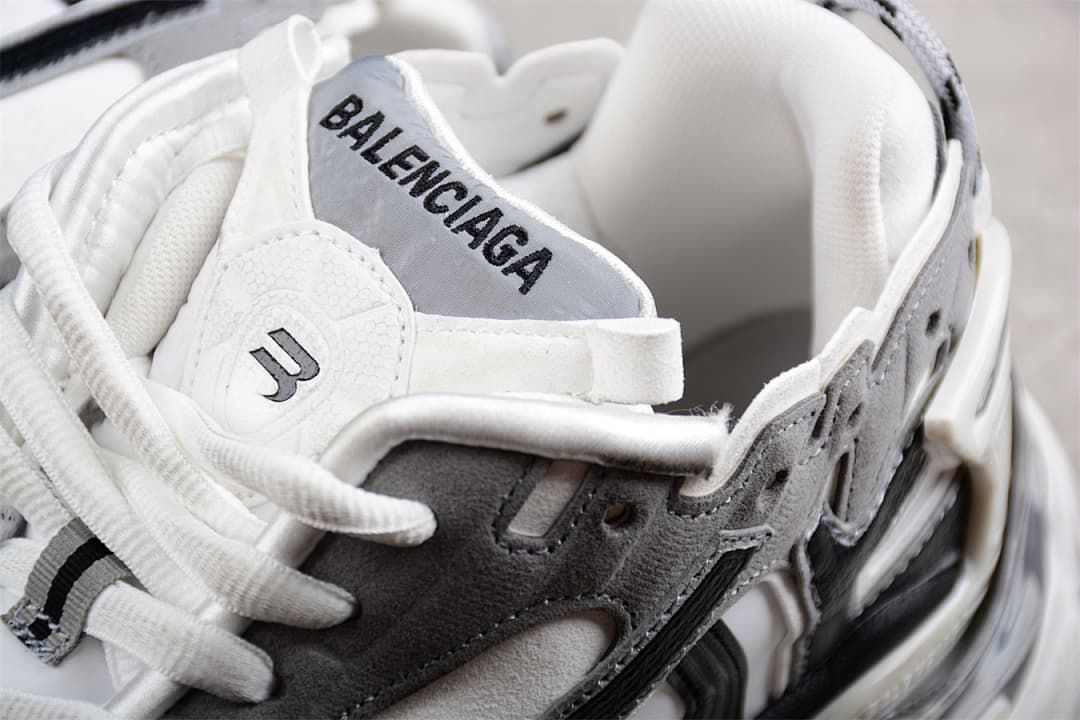 Close-up of the tongue, laces, and layered upper panels