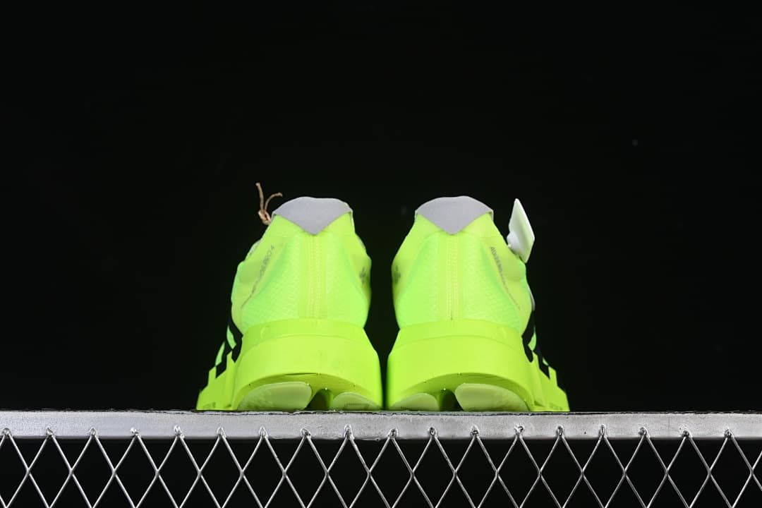 Rear view of the pair of lime green shoes