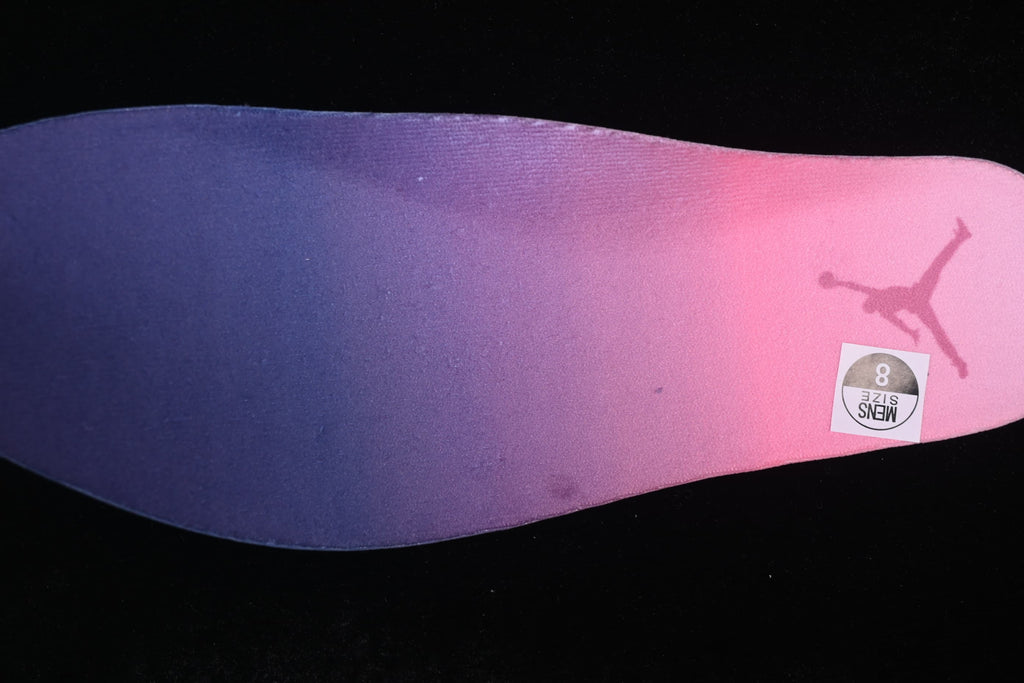 Purple-to-pink gradient insole with a Jumpman graphic.