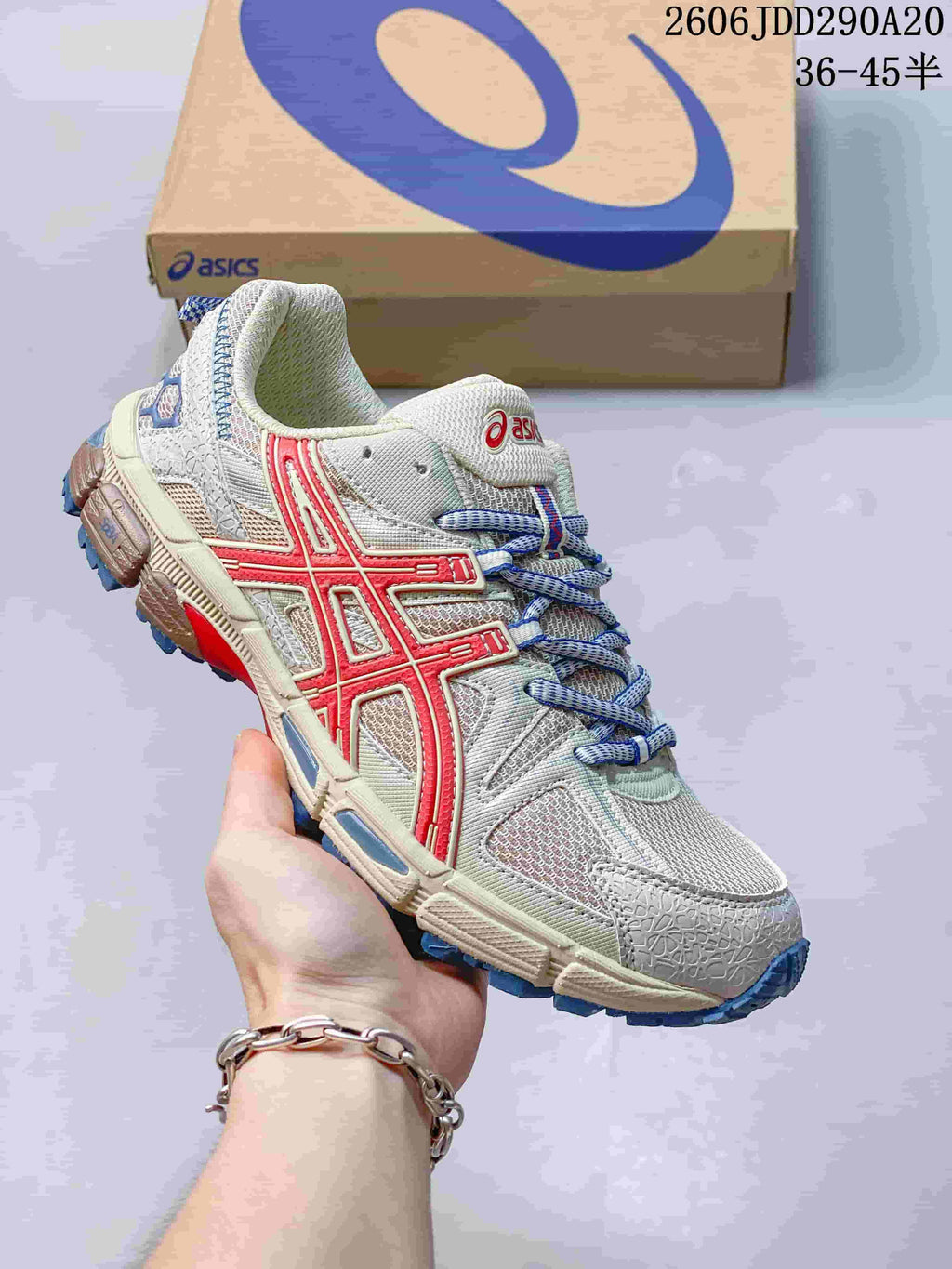 ASICS Gel-Kahana 8 sneaker in light grey with red and blue accents.