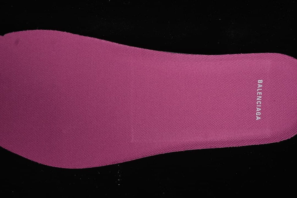 Close-up of the pink insole with brand lettering