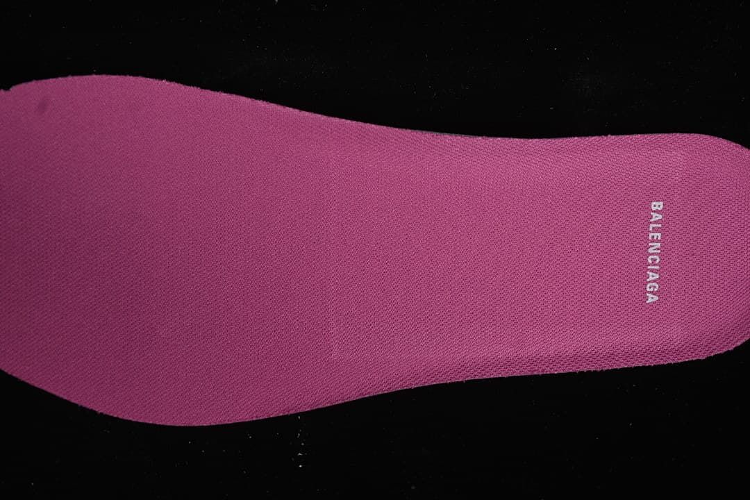 Close-up of the pink insole with brand lettering