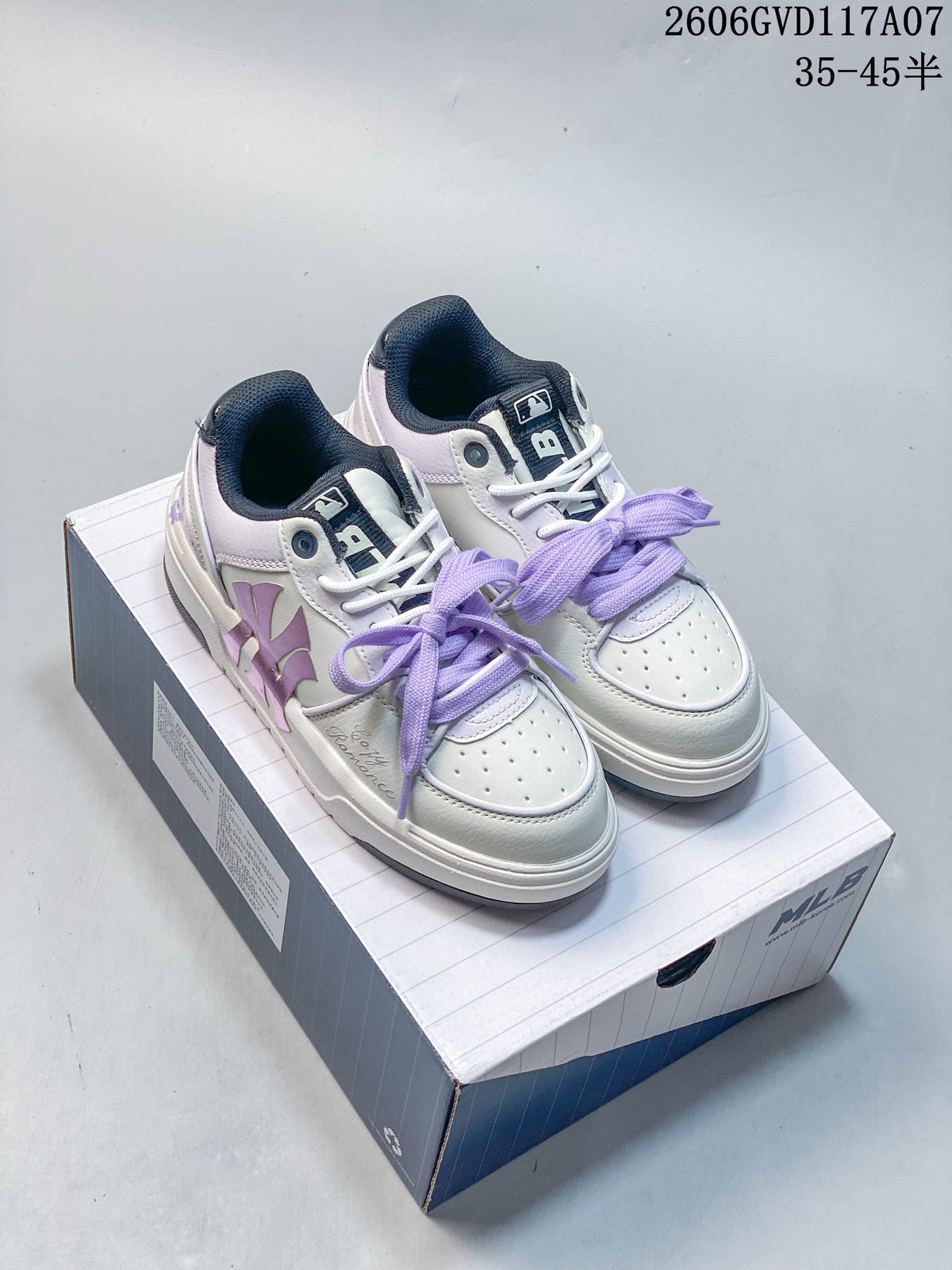 Pair of white MLB Chunky Liner sneakers with lavender accents and contrasting dark details
