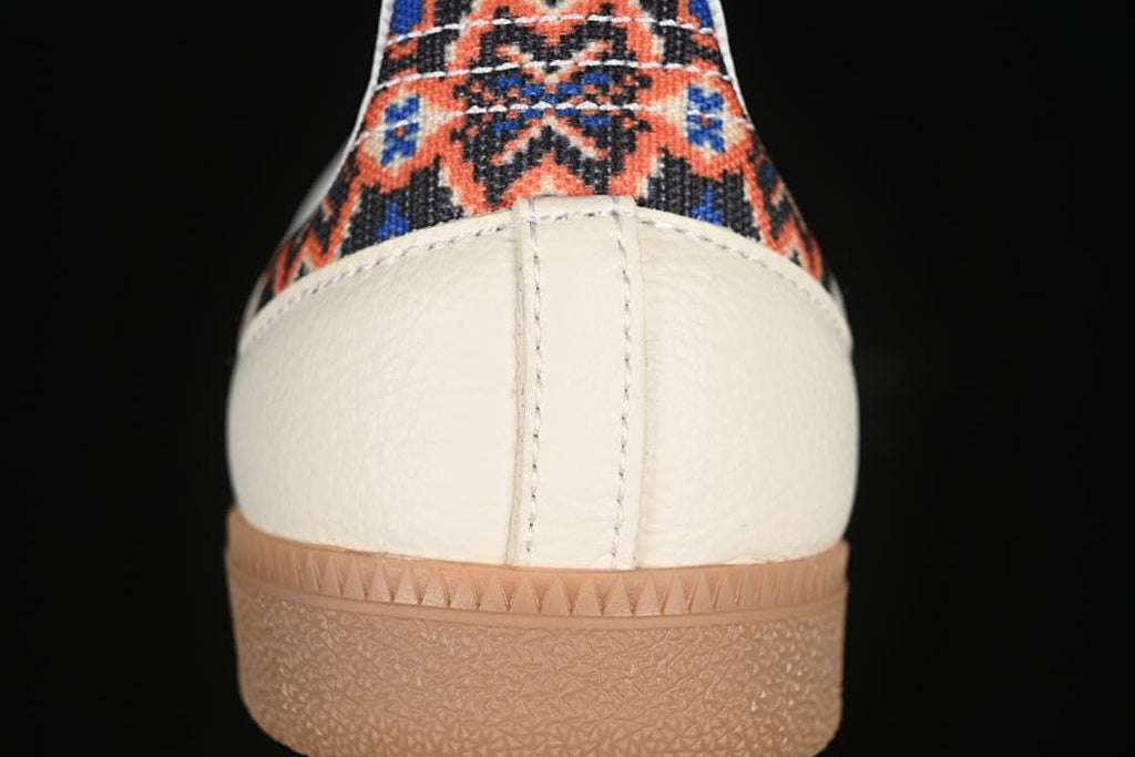 Rear view highlighting the patterned heel panel and gum-colored outsole