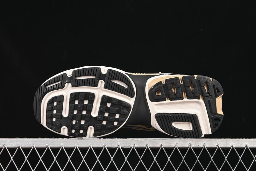 Underside view showing the black-and-white patterned outsoles