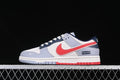 Side view of a gray, white, navy and red low-top sneaker with Supreme branding