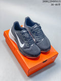 Pair of dark gray Nike Air Zoom Pegasus 42 shoes on an orange shoebox