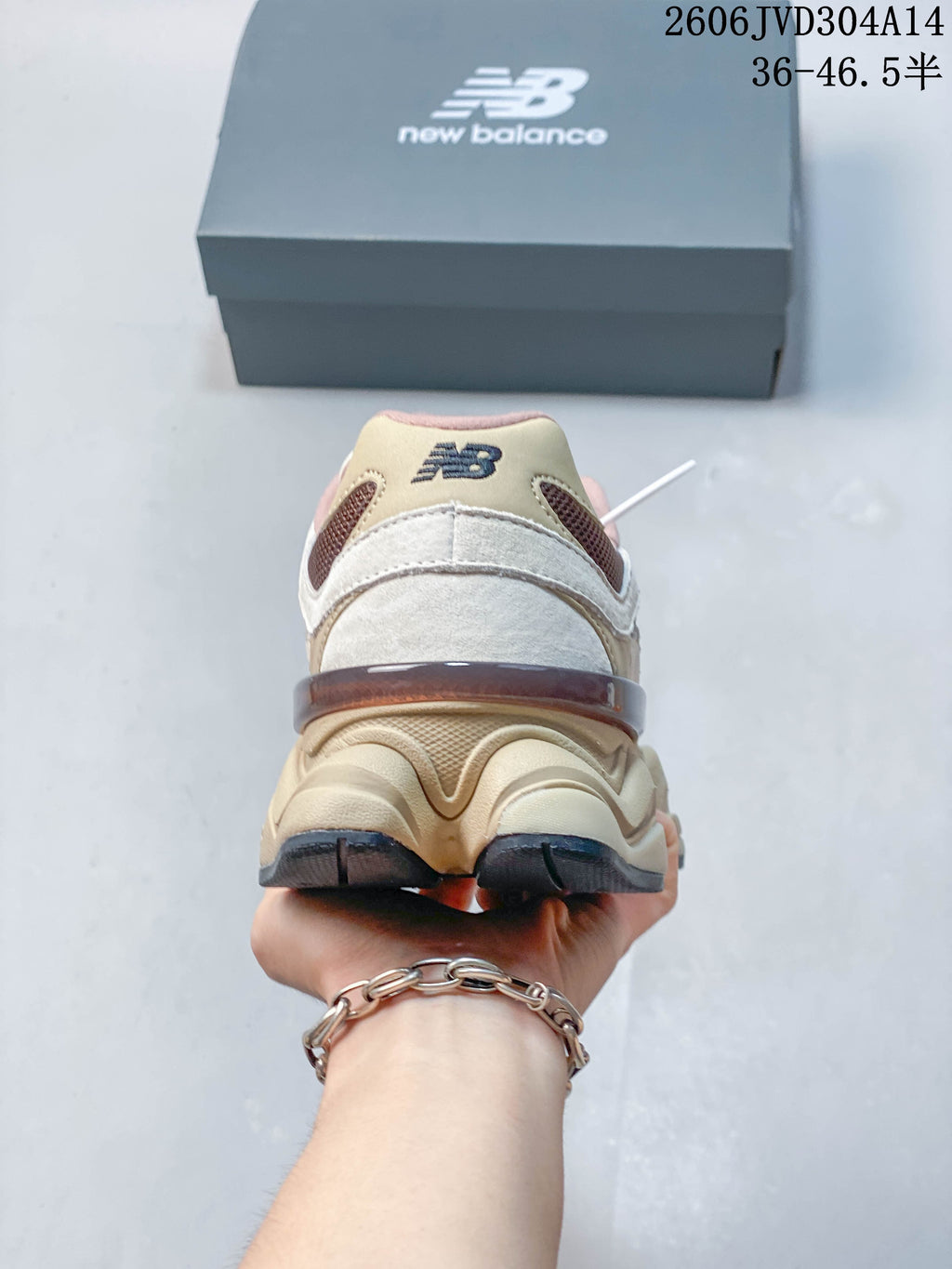 Rear view of a New Balance 9060 sneaker with a layered heel and sculpted sole