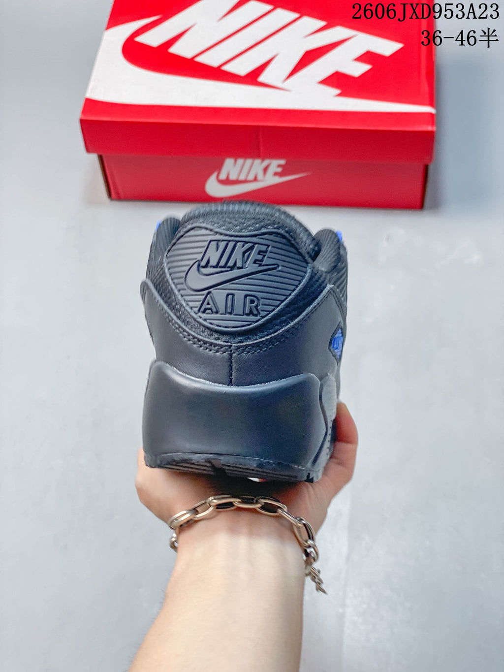 Rear view of the gray Nike Air Max 90 heel