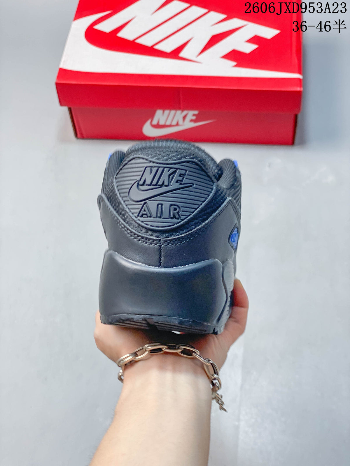 Rear view of the gray Nike Air Max 90 heel