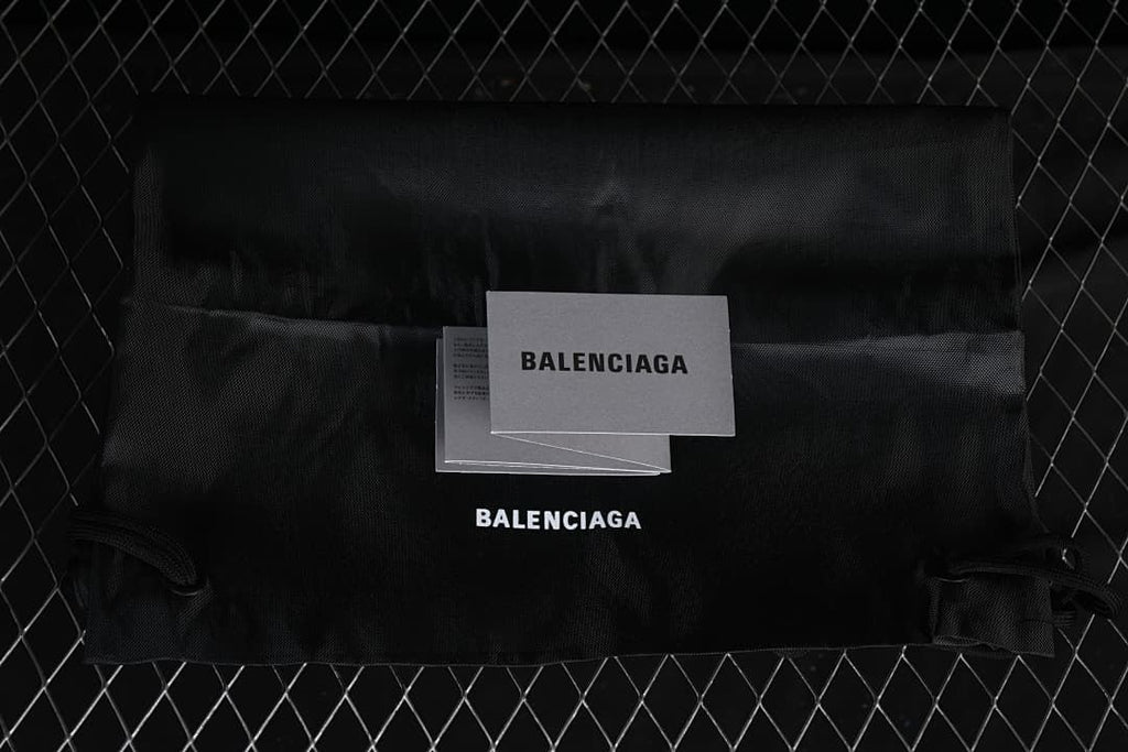 Balenciaga-branded dust bag and printed cards