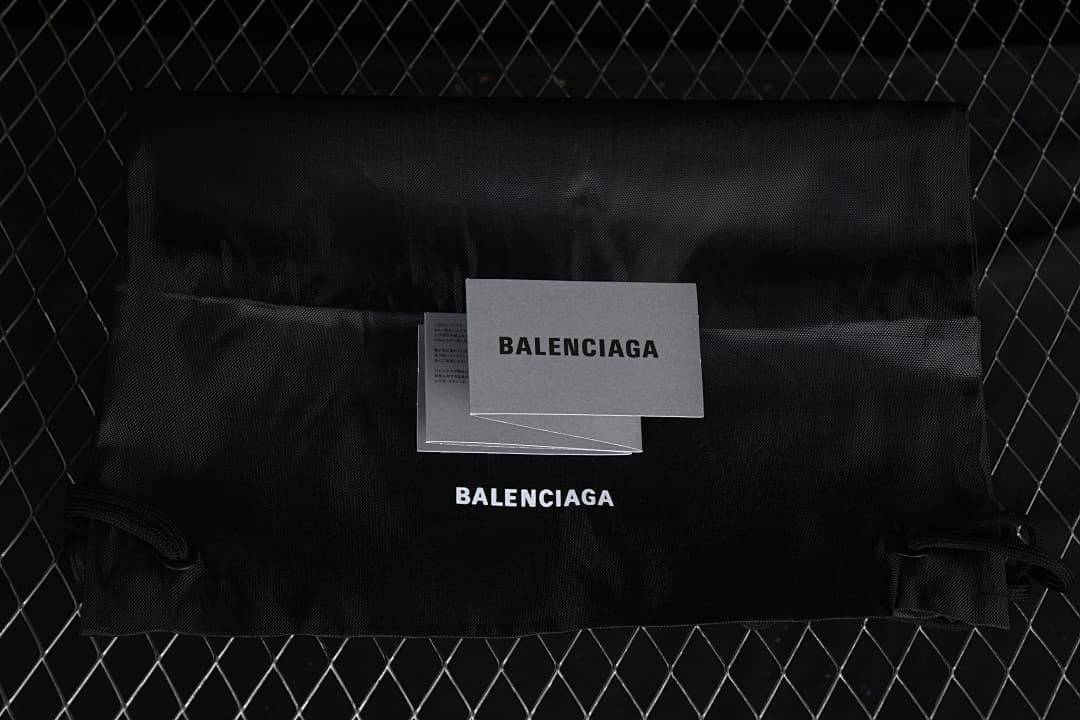 Balenciaga-branded dust bag and printed cards