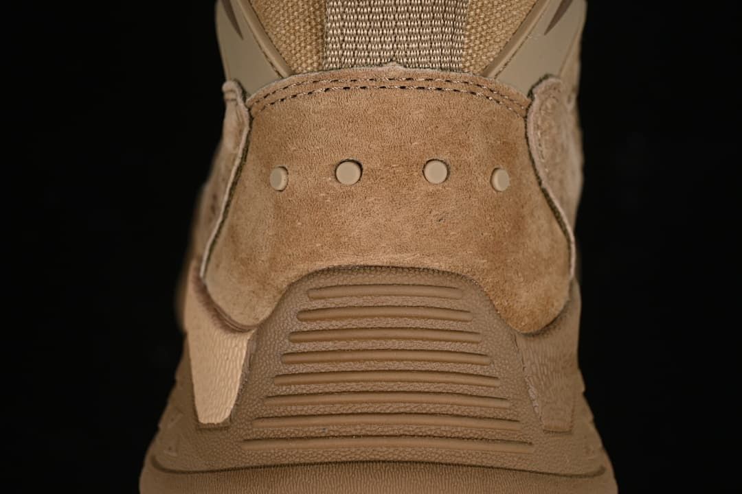 Rear view showing the heel panel, stitching, and outsole.