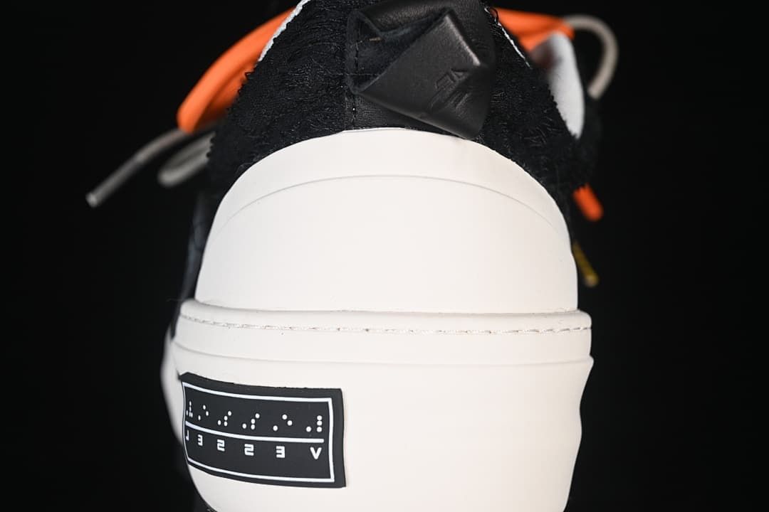 Rear view showing the white platform heel and label