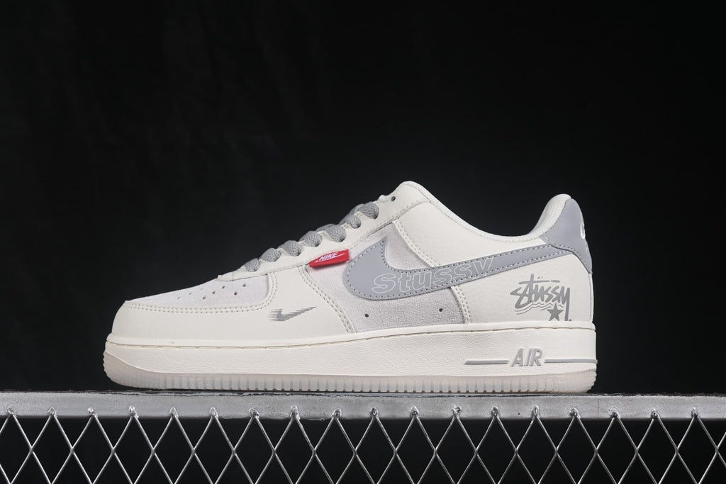 Side profile showing gray side detailing, graphic accents, and Air branding.