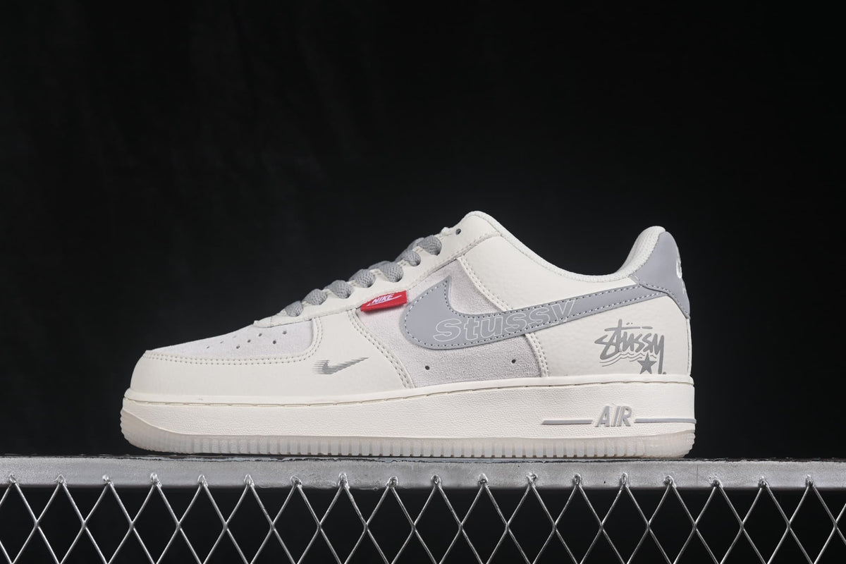 Side profile showing gray side detailing, graphic accents, and Air branding.
