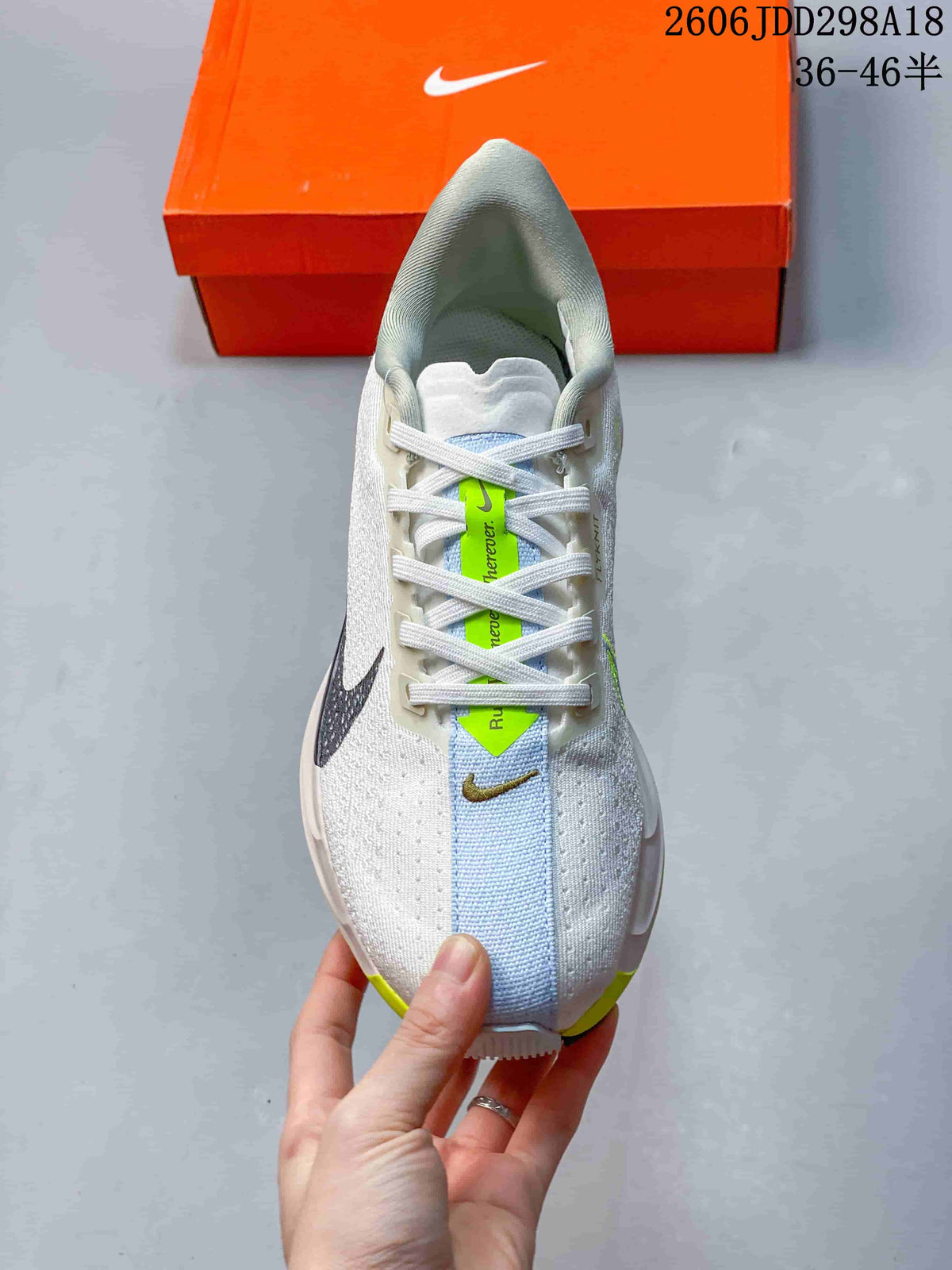 Top view showing the laces, tongue, and pale blue center detail