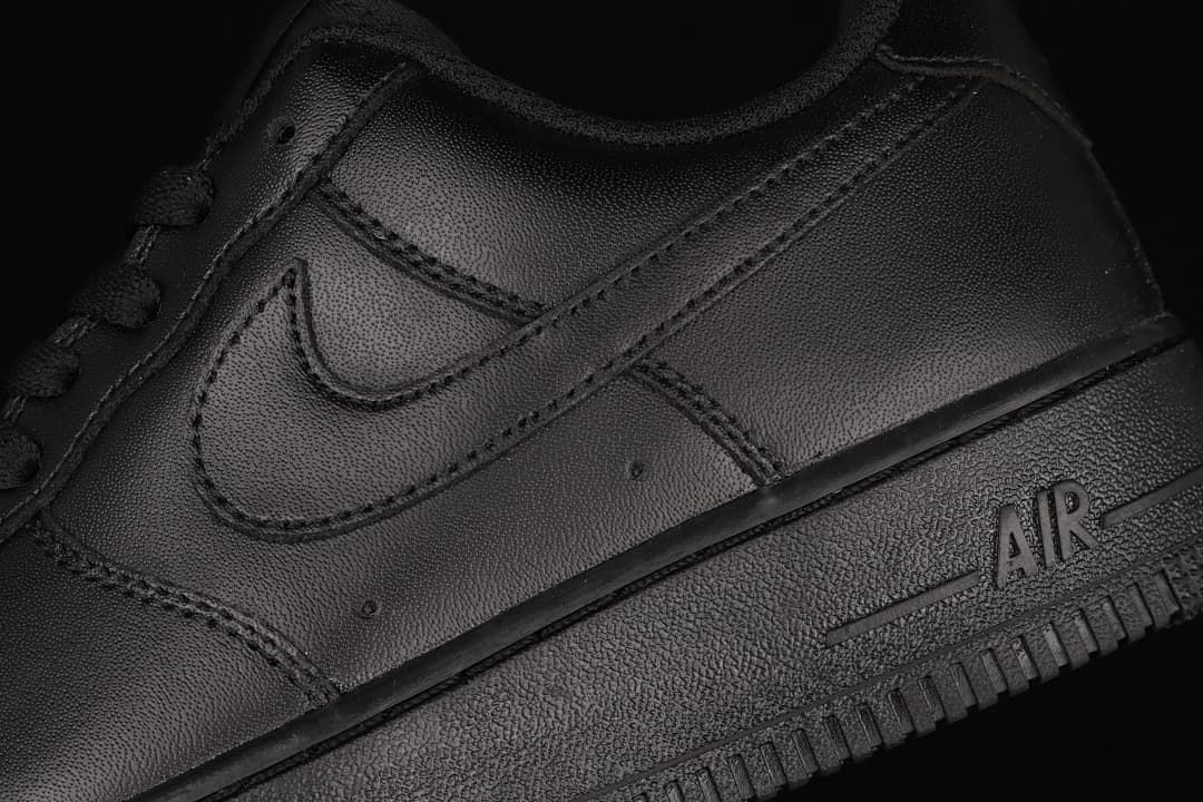 Close-up of the black side Swoosh and Air-marked midsole.