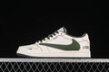 Side view of a white Nike low-top sneaker with a dark green Swoosh and dark green outsole