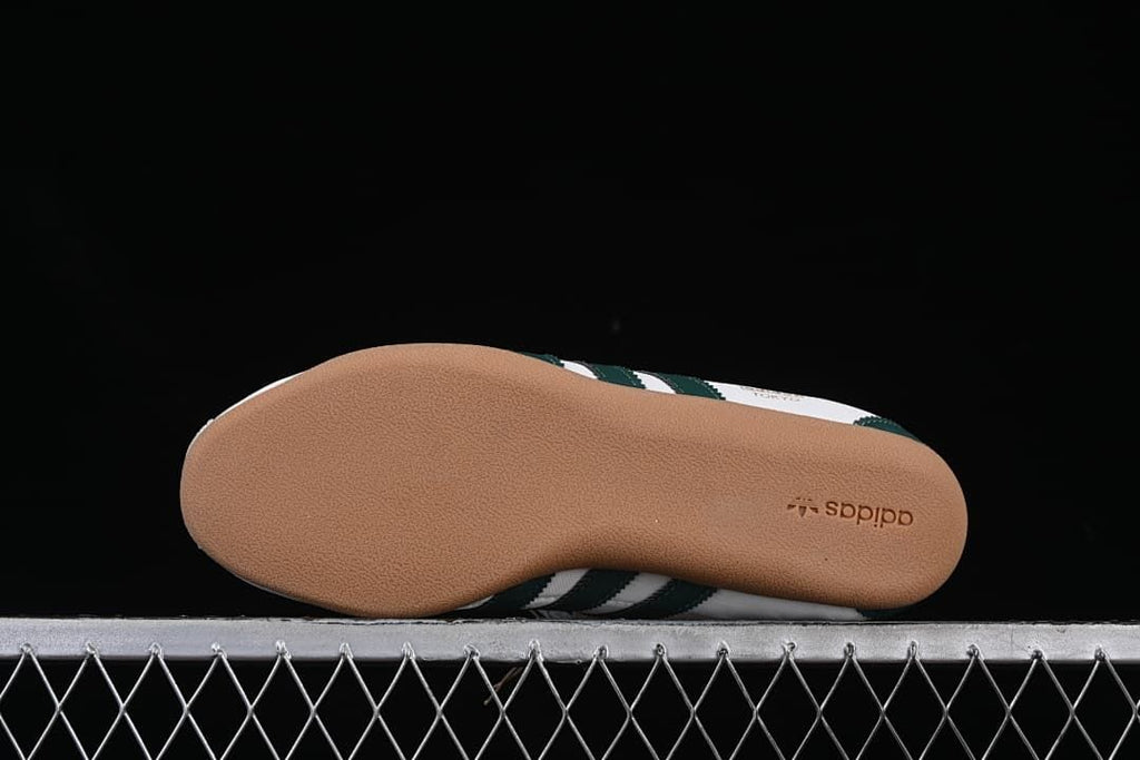 Underside view of the gum-colored outsole