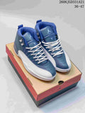 Blue and white high-top Air Jordan 12 shoes displayed on a shoe box