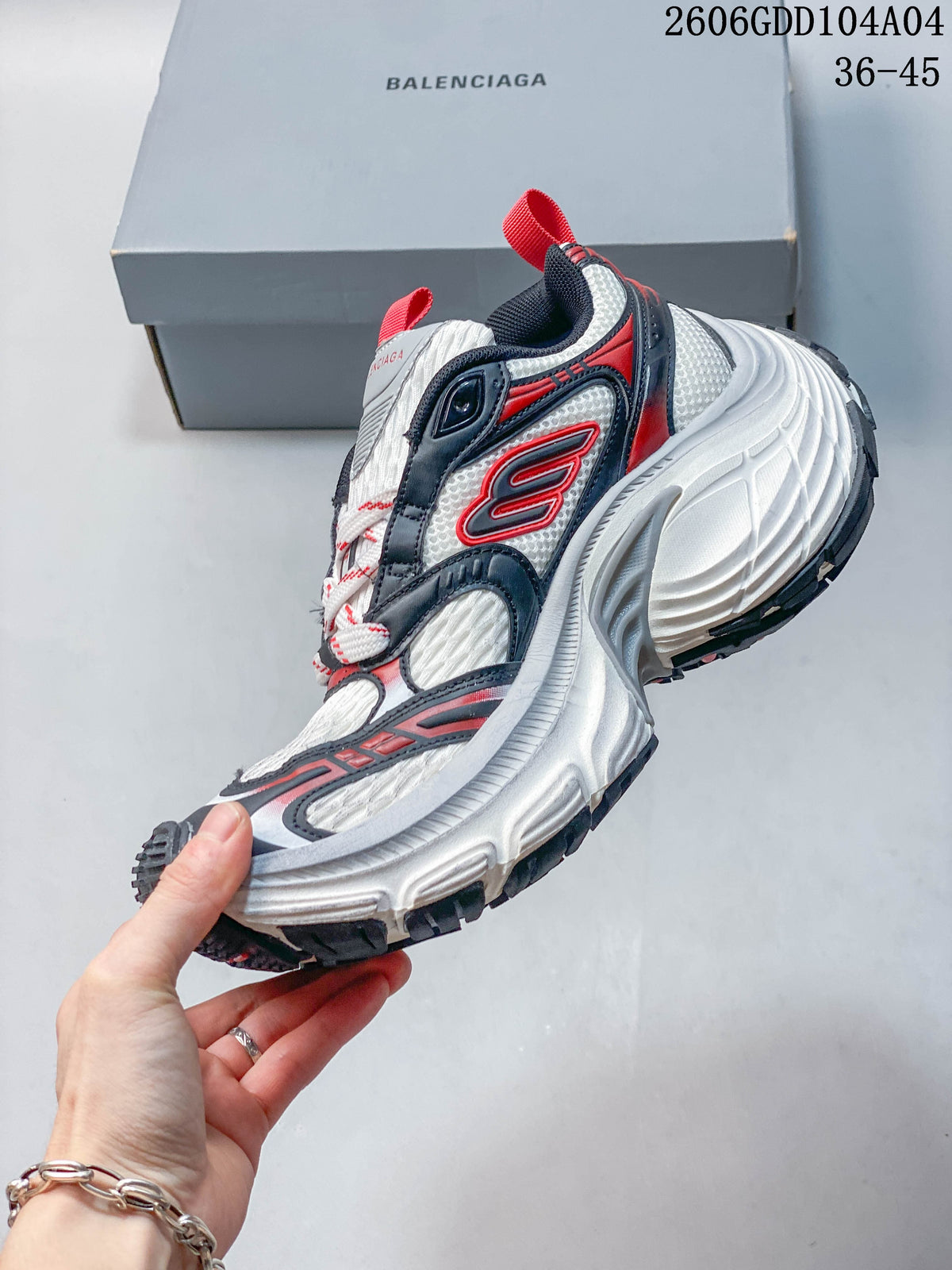 Side view of the layered sneaker upper and thick sculpted sole