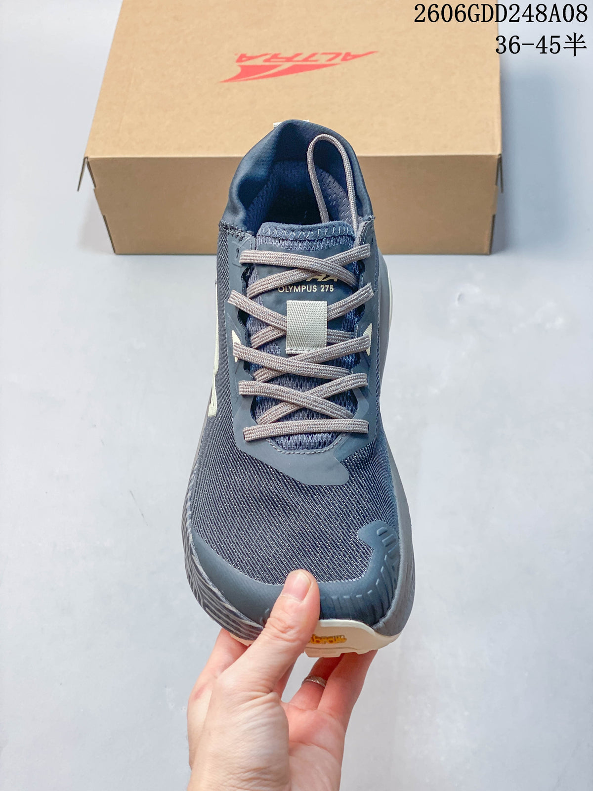 Front view of an Altra Olympus 275 shoe with lace-up closure