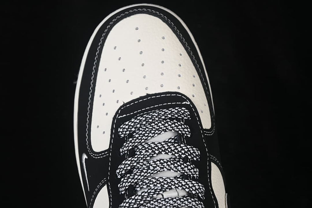 Top view of the perforated off-white toe and patterned laces.
